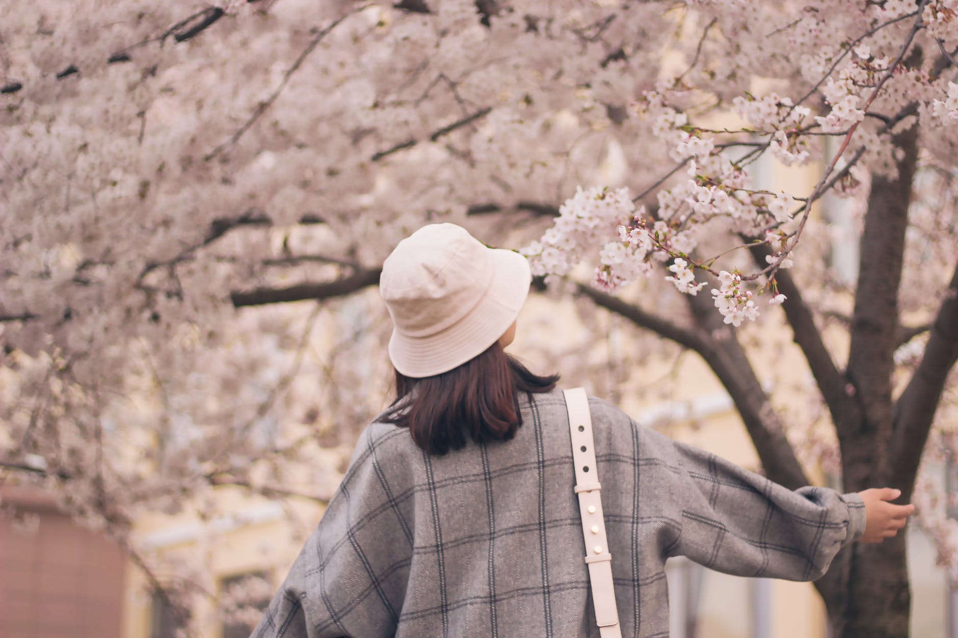 photo of girl wearing bucket hat